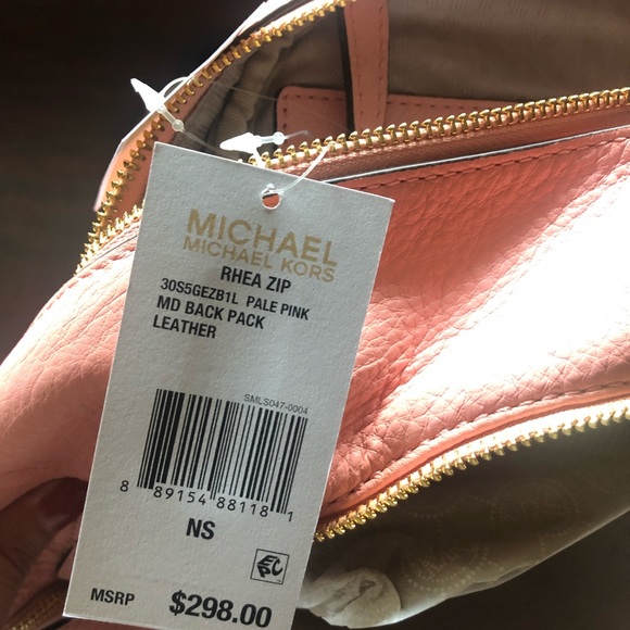 Michael Kors Leather Backpack - Picture 2 of 8